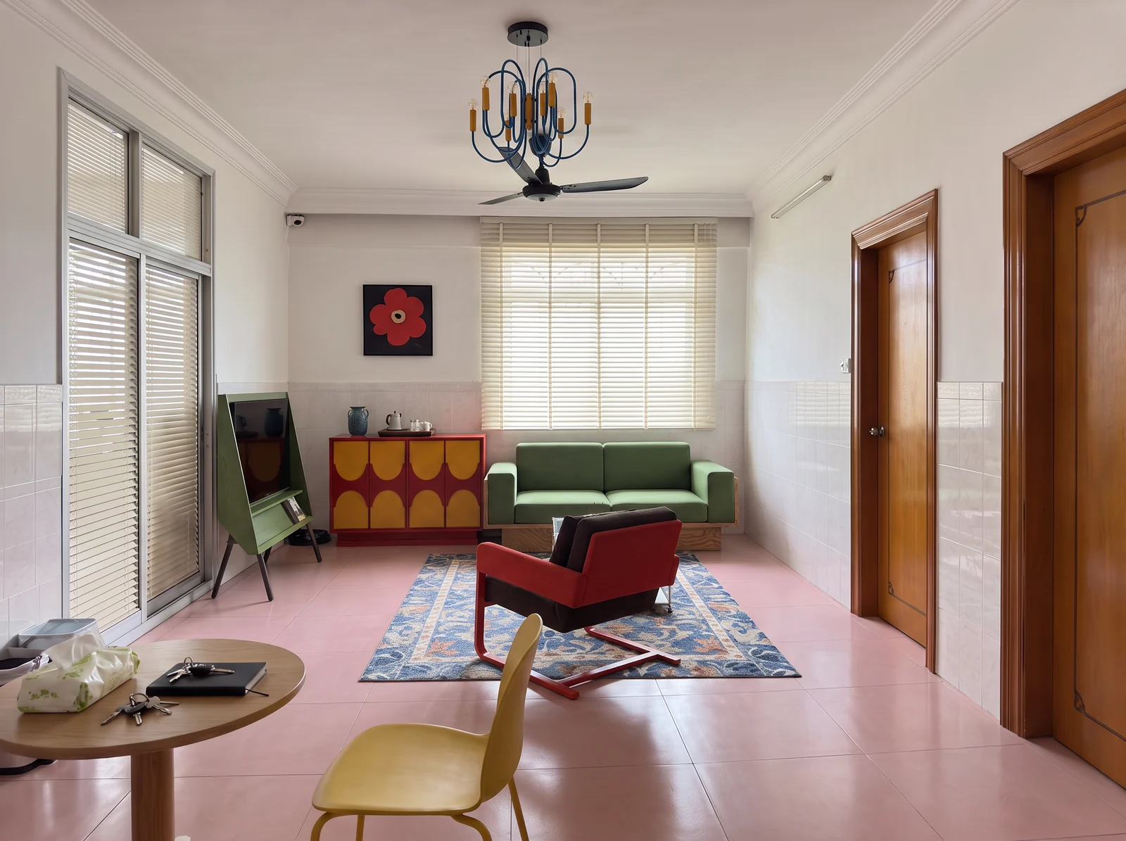 Proposed colorful living room with pale green sofa, red chair, arched red and yellow cabinet and pink tile floor.